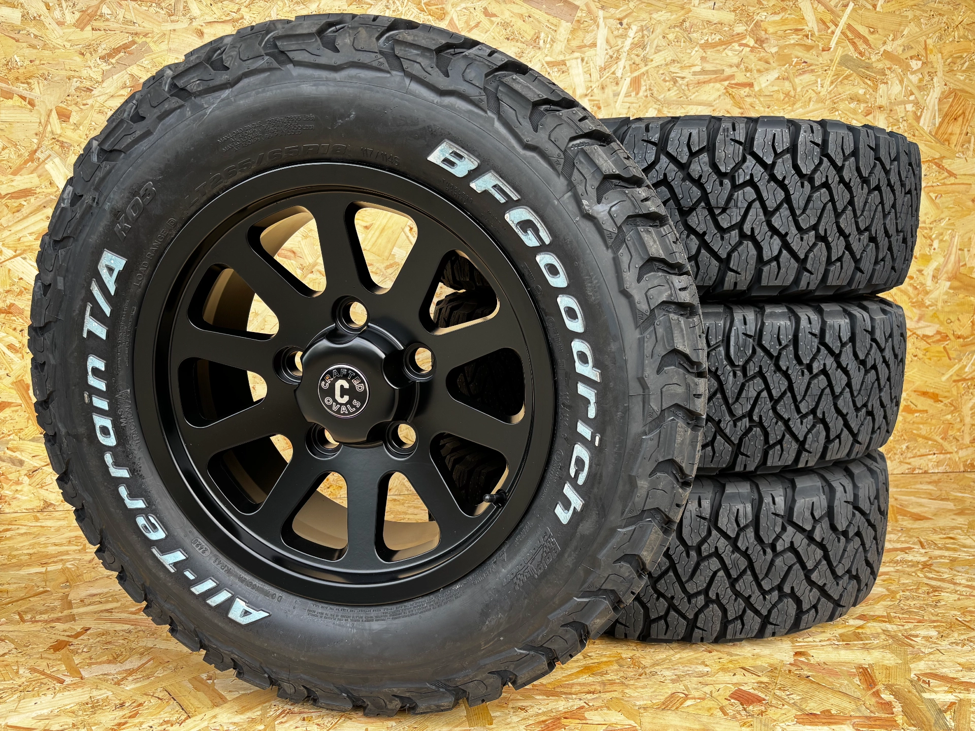 18″ SQUADRON SATIN BLACK ALLOYS + BFGOODRICH ALL TERRAIN KO3 – 265/65R18 TYRES X 4
