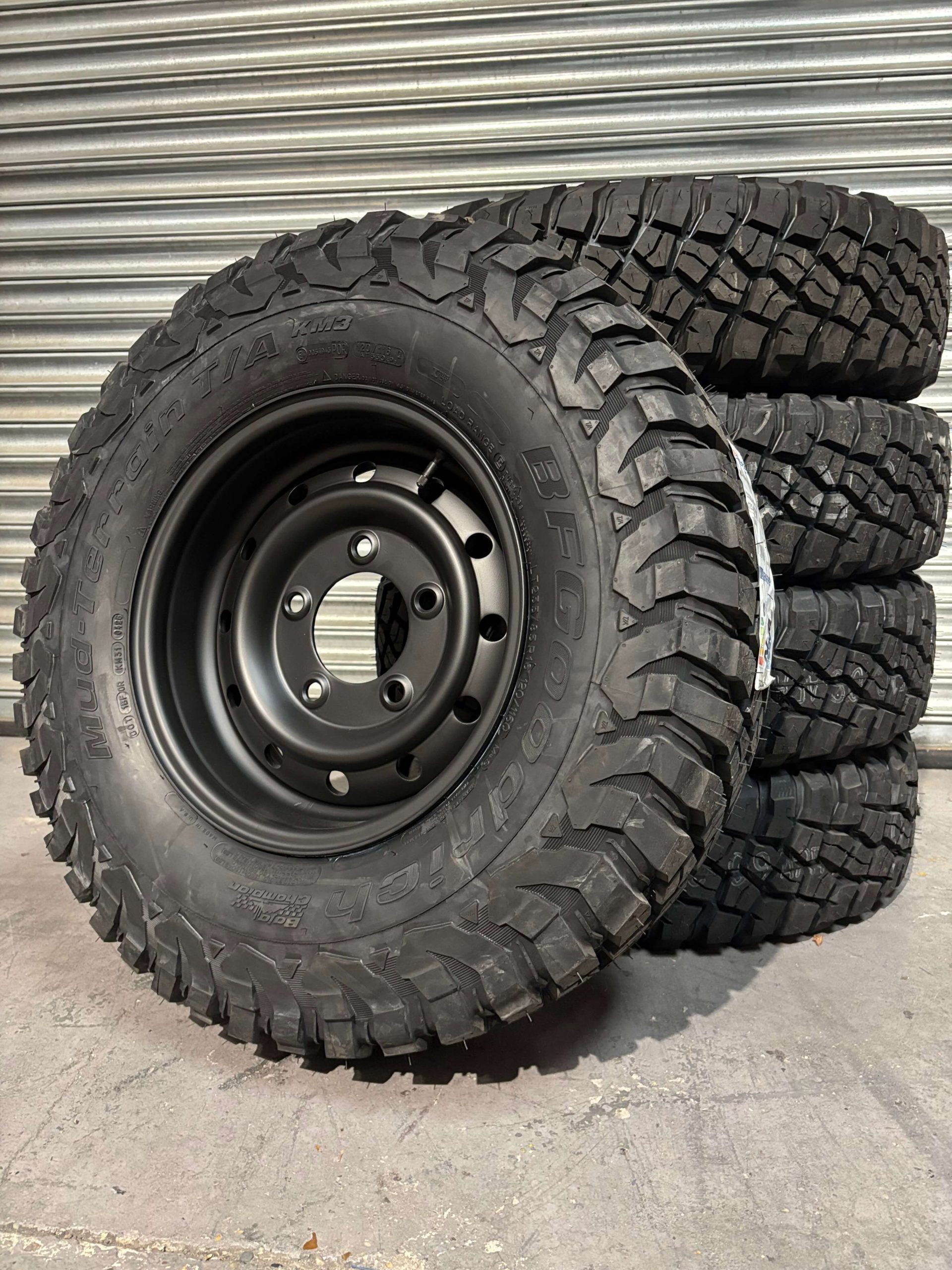 BFGoodrich Mud Terrain KM3 235/85r16 & SATIN BLACK Wolf Style Steel Rims (ET0) to fit Defender x 5